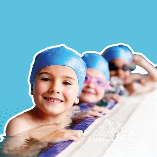 Smiling children in a swim lesson